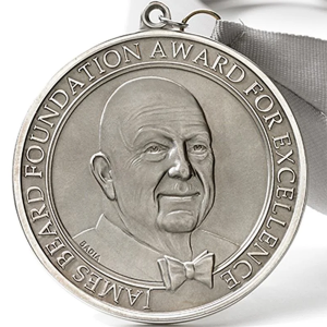 A James Beard Award on a ribbon